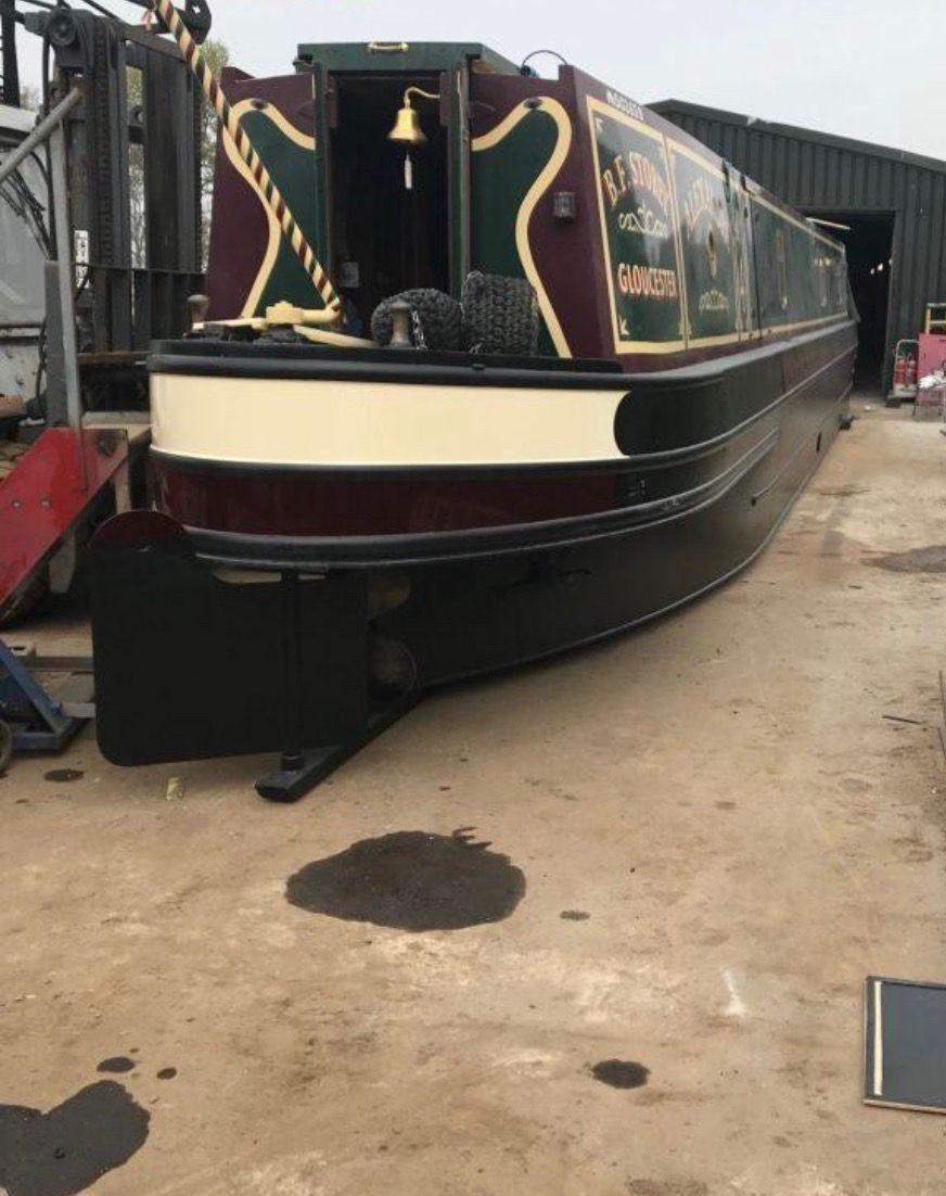 2 pack hull blacking narrowboat after finished hull treatment at Teddesley Boat Yard
