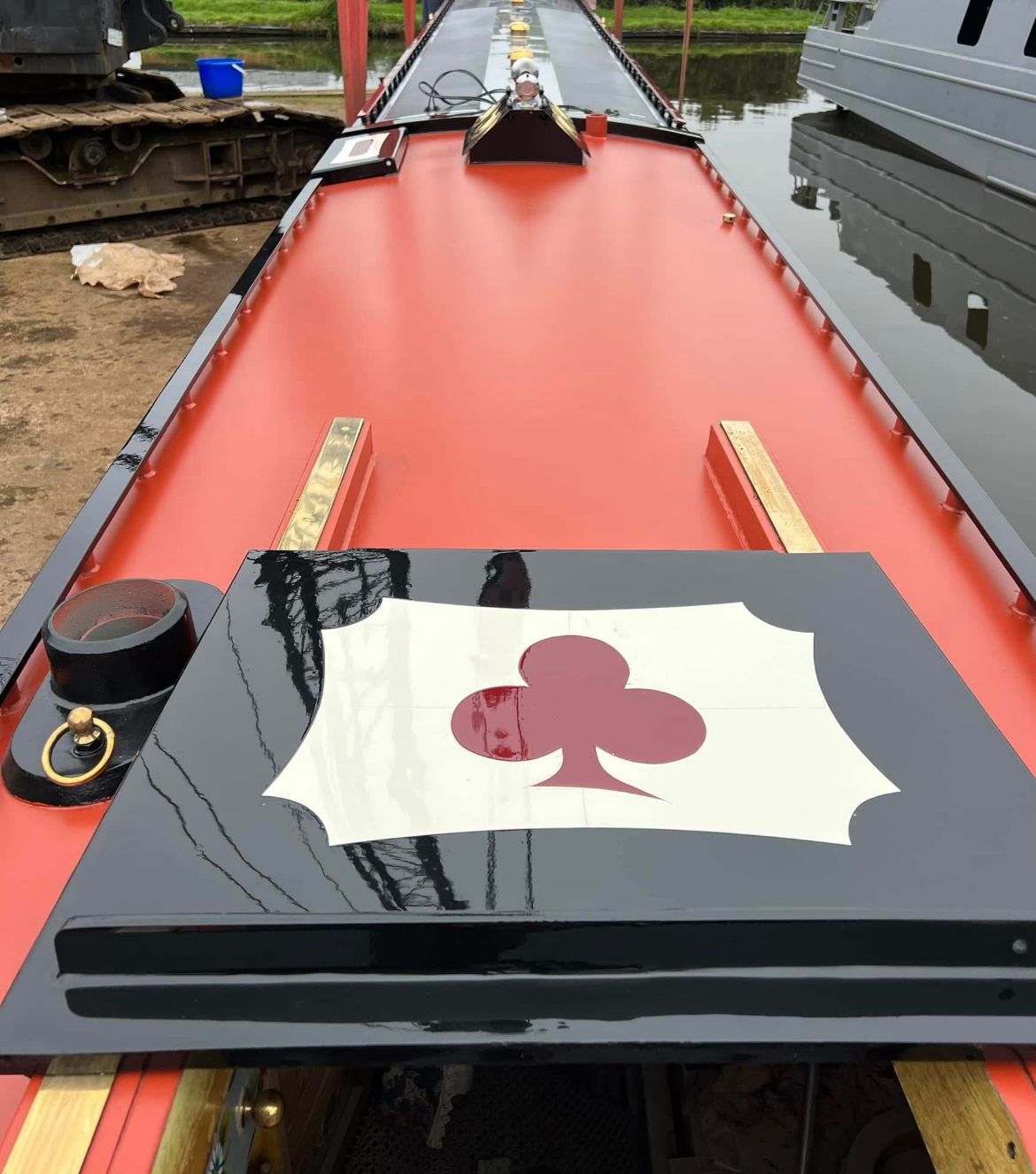 Red narrowboat roof with club decorative panel and gloss finish