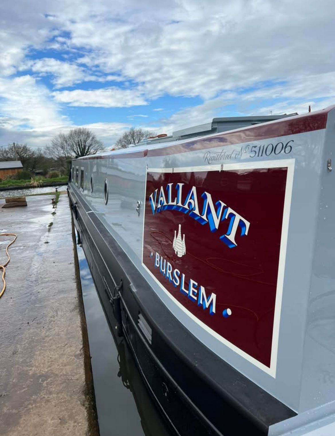 Valiant Burslem narrowboat with maroon signwriting panel and finished grey paintwork
